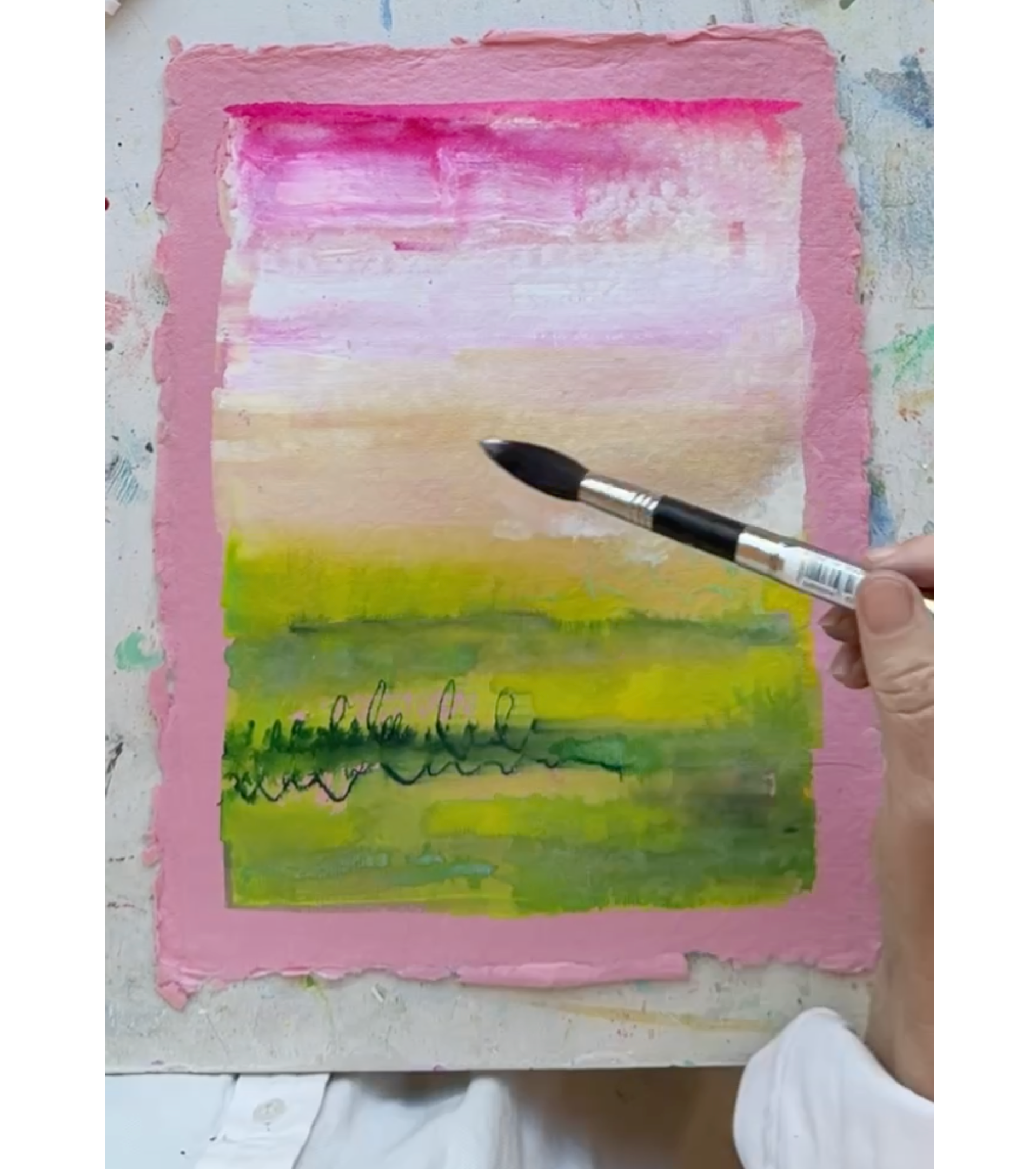 picture showing landscape painting being painted by the artist