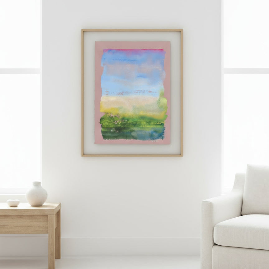 Abstract watercolor painting with a gradient of blue, green, and pink on a pink background