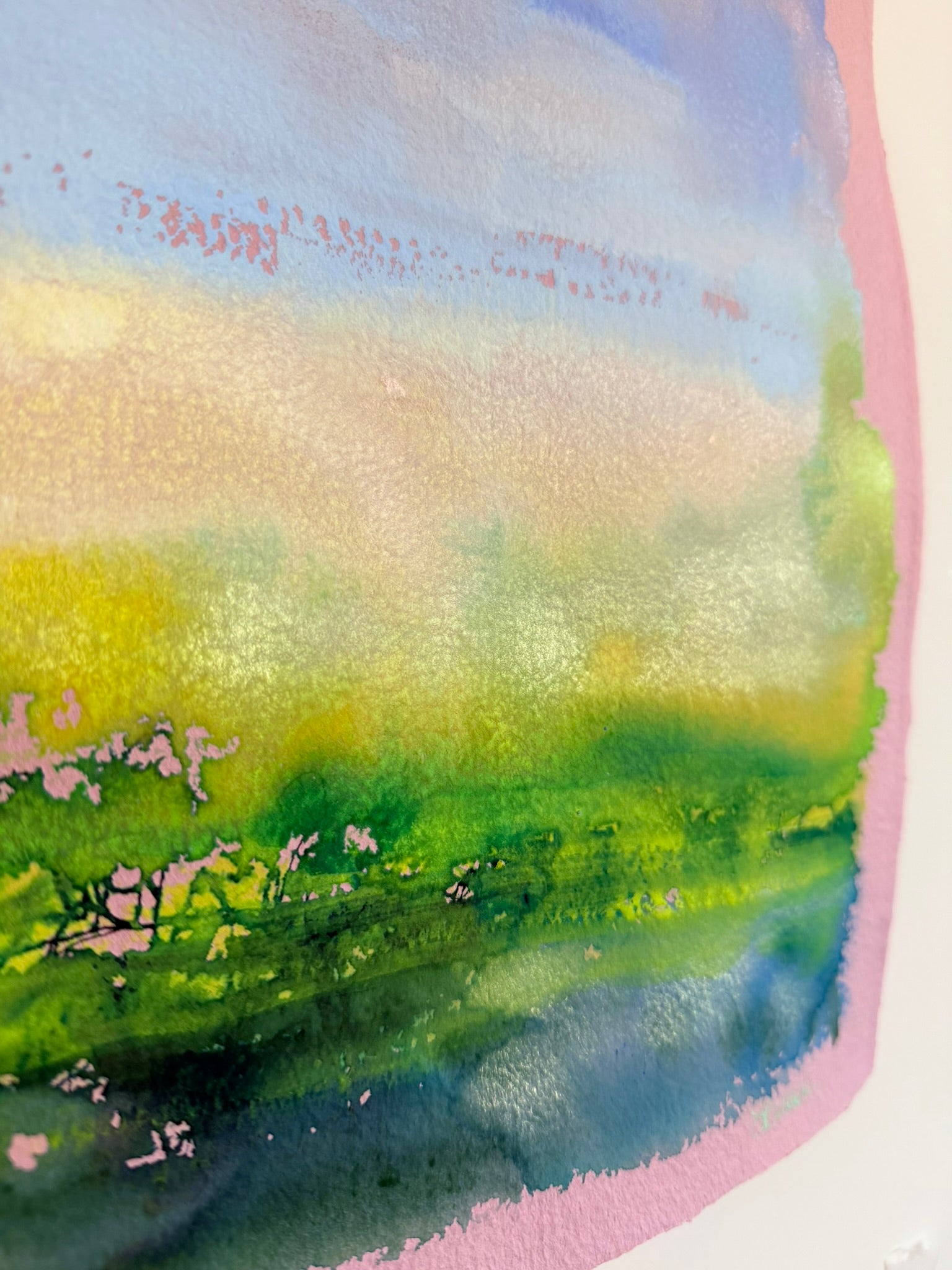 Colorful abstract painting with green, blue, and pink hues on a white background